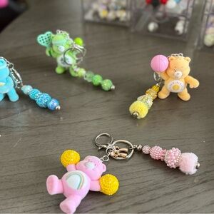 Care Bears Keychain Trio - Pink, Green, Yellow
